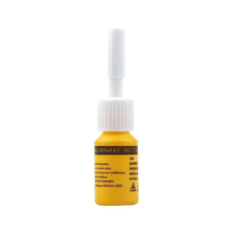Yellow three-piece car windscreen repair kit with glass repair liquid