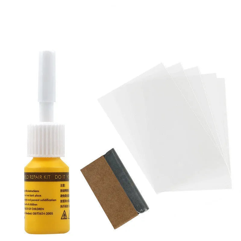 Yellow three-piece car windscreen repair kit with glass repair liquid