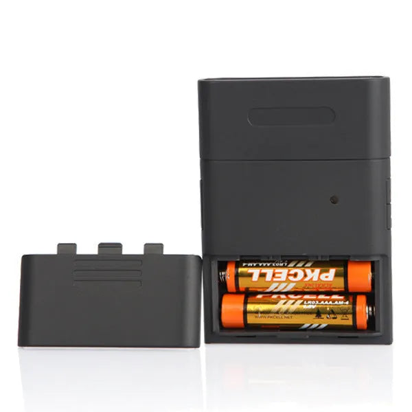 Black handheld At-838 alcohol breath detector with display screen showing BAC measurement