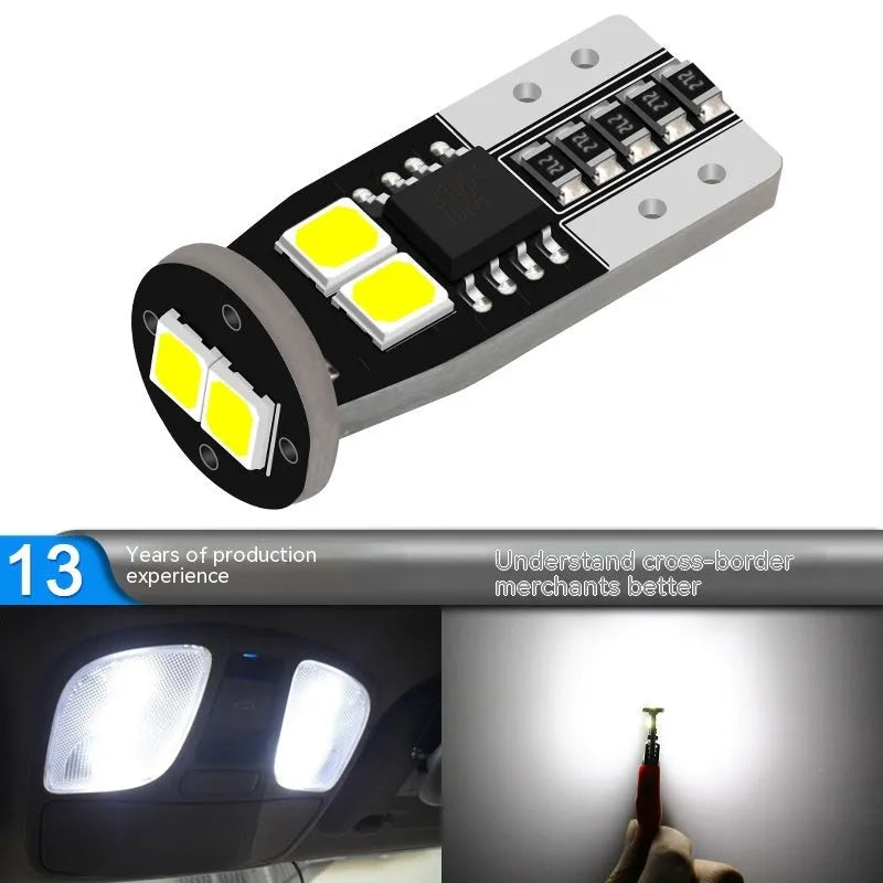 Small white 12V car number plate reading lamp with fibreglass housing.