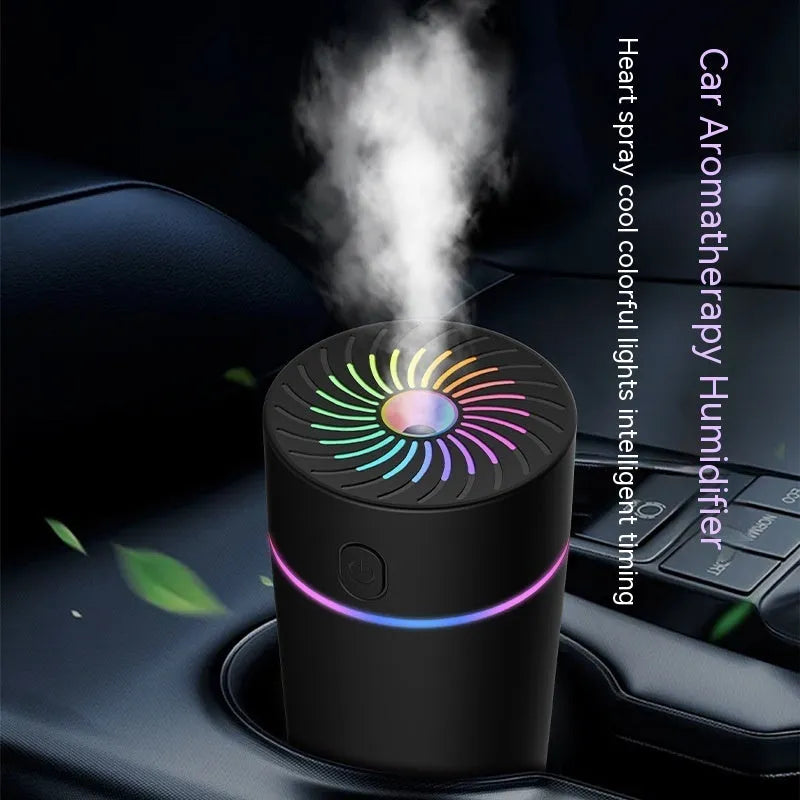 Compact white car USB mini humidifier with aromatherapy function positioned in vehicle cup holder