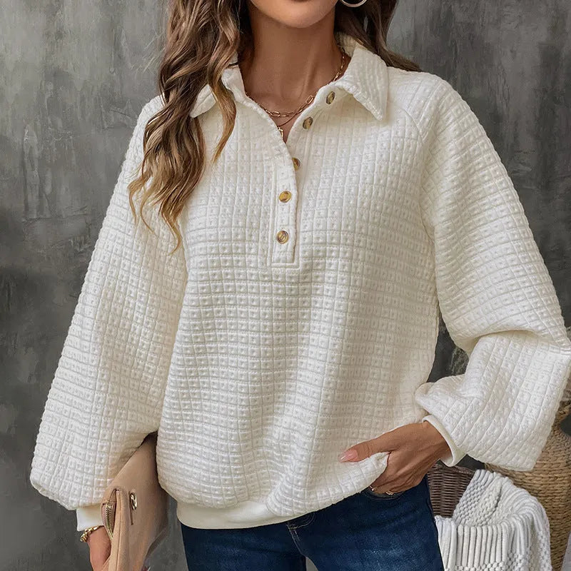 Women's beige polo neck thick polyester sweater on a hanger