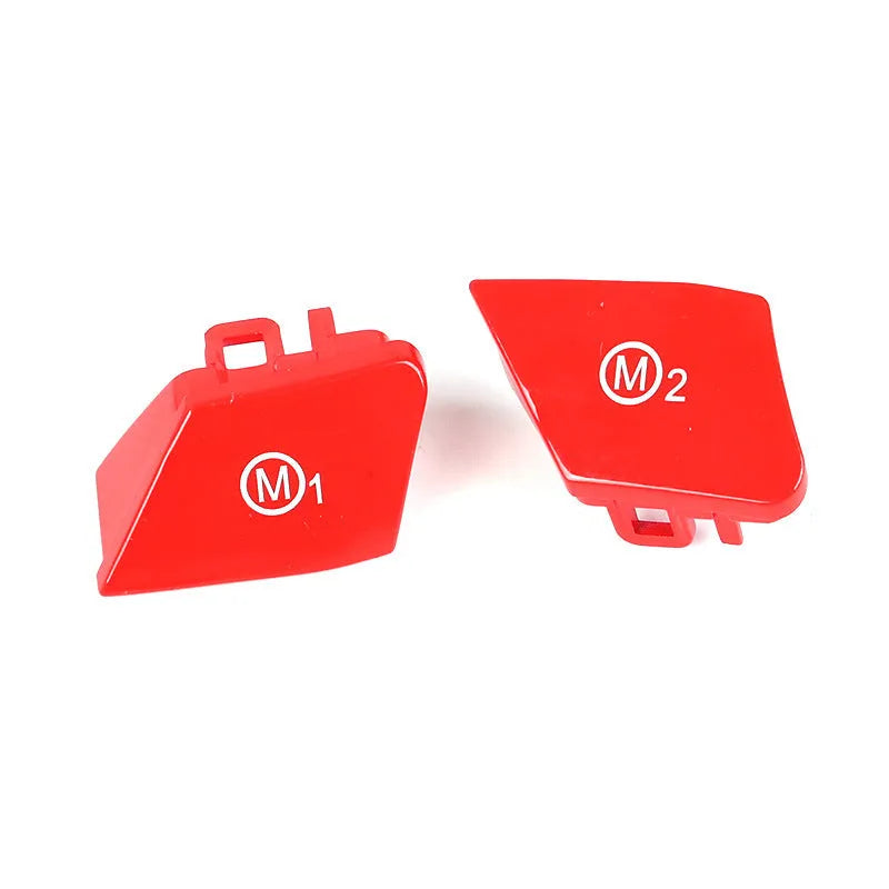 A pair of red M1M2 steering wheel mode buttons for BMW F30 and F34 models