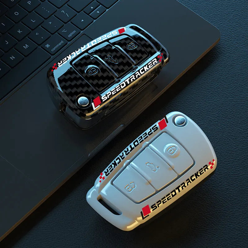 Carbon fibre style car key cover with mirror accent in carbon and white colour options