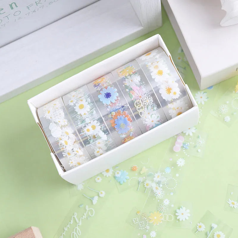 Five rolls of transparent decorative tape with colourful Midsummer Daisy cartoon designs