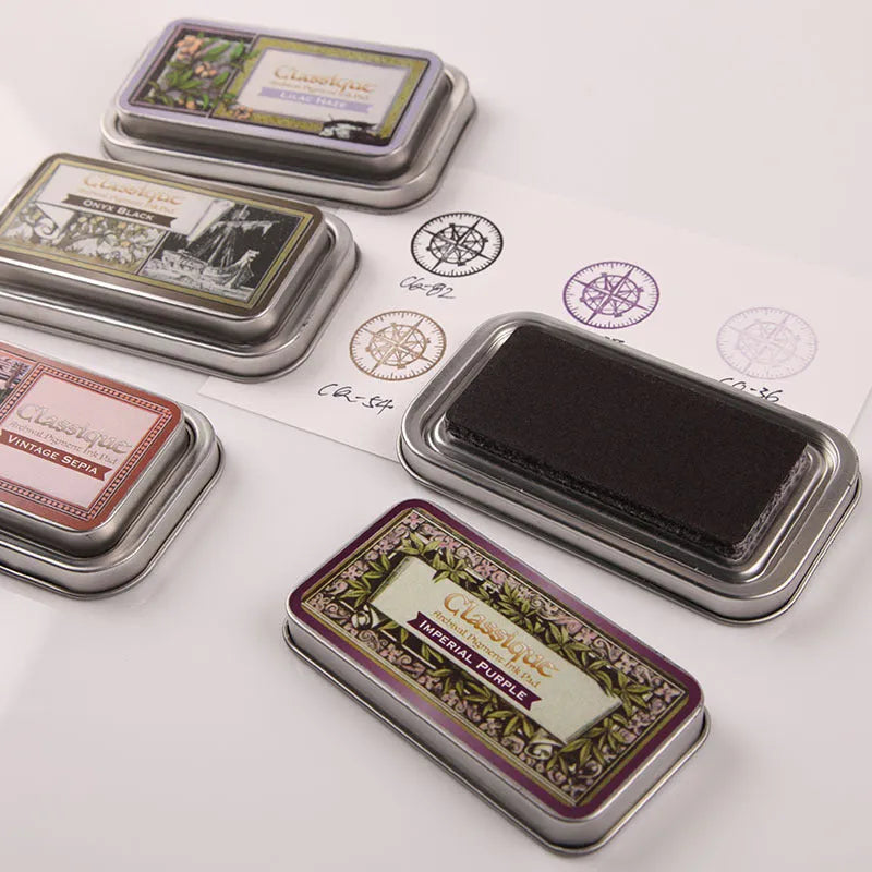 Quick-drying oily ink pad for rubber stamps in rectangle shape, showing colour options.