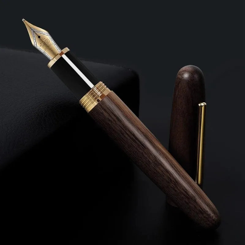 Wooden fountain pen with rotating cap shown in selected wood finish with chosen nib type.