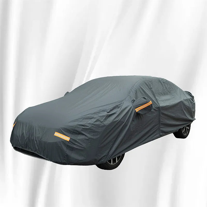 Grey Volkswagen car cover with PVC chemical fibre material shown in outdoor setting