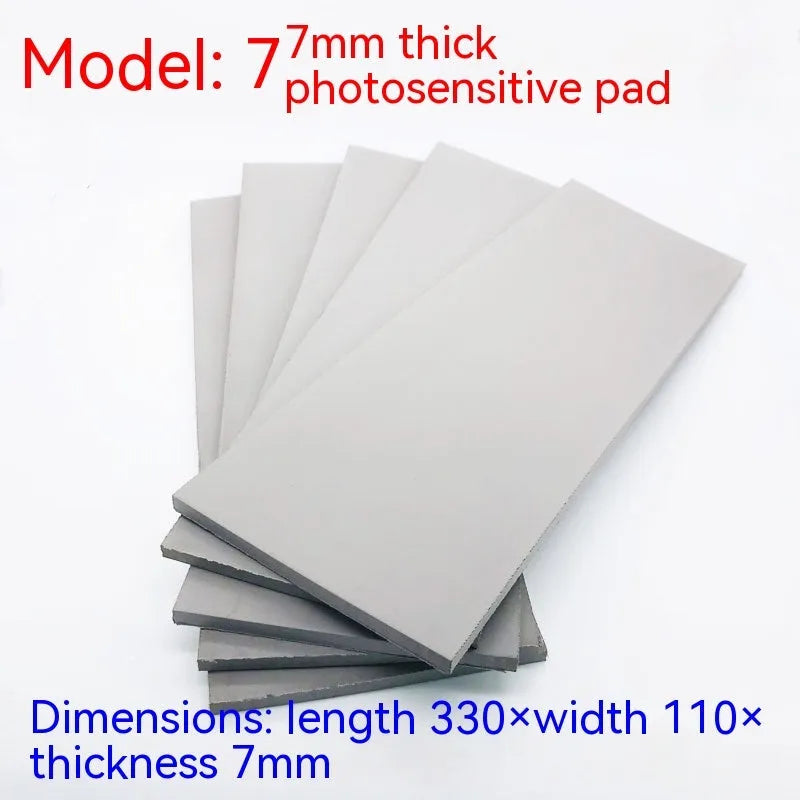 Black and gray plastic light-sensitive mat for seal making measuring 330x110mm