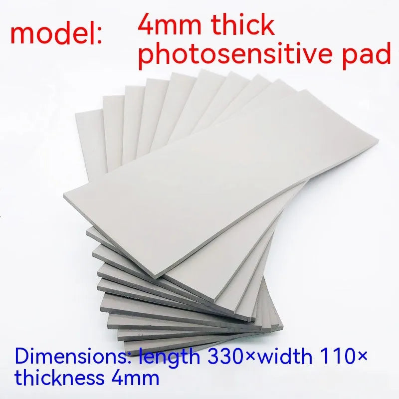 Black and gray plastic light-sensitive mat for seal making measuring 330x110mm