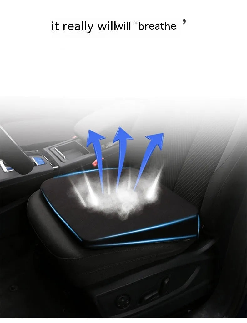 Black car seat cushion with thick foam padding measuring approximately 42cm by 39cm