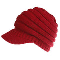 Women's soft acrylic ponytail beanie in light grey, showing the opening for a ponytail.