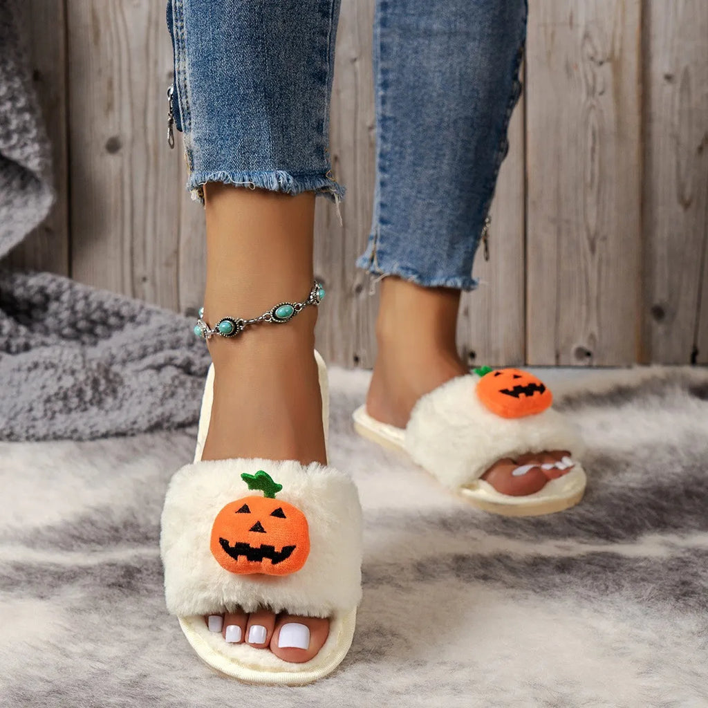 Yellow and white cartoon pumpkin plush slippers with synthetic fur and PVC anti-slip sole.