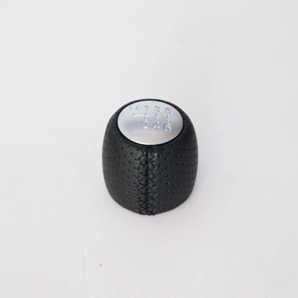 Sewn wrapped perforated leather handball gear for Alpha vehicles in Black, Red, and White Line options.