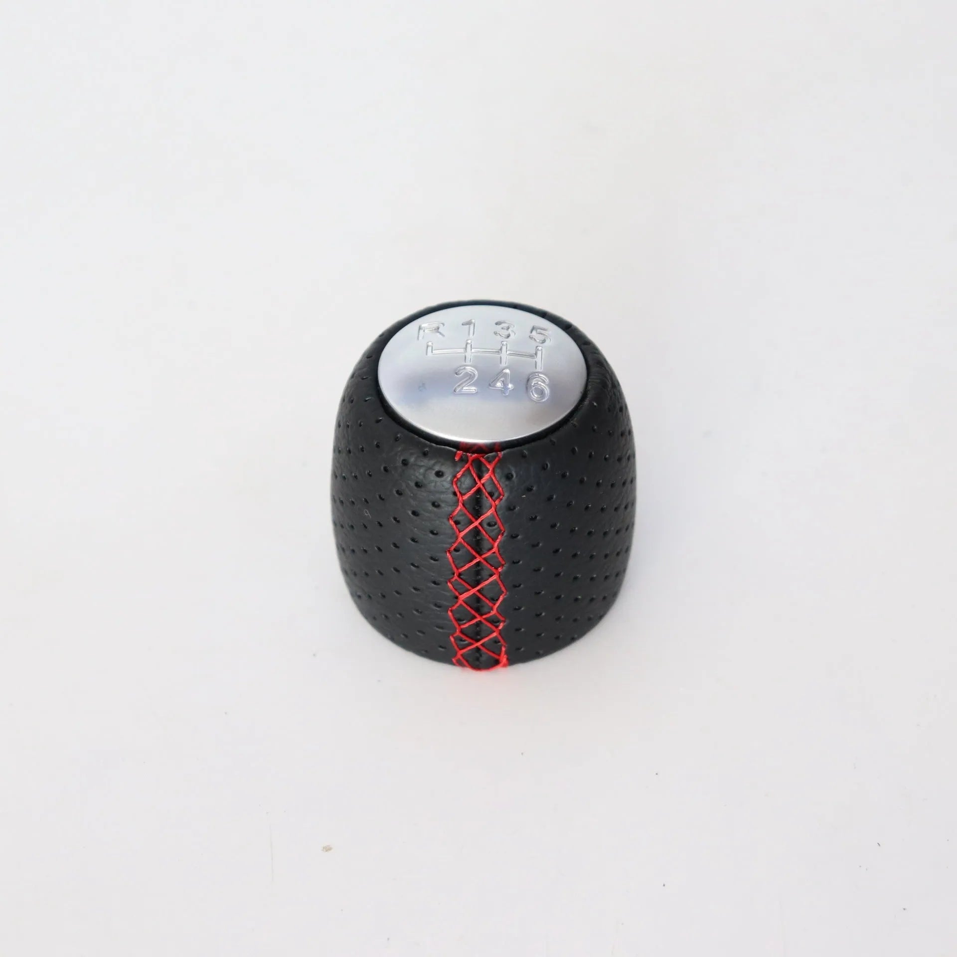 Sewn wrapped perforated leather handball gear for Alpha vehicles in Black, Red, and White Line options.
