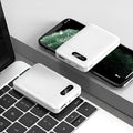White portable power bank with multi-USB ports measuring 92x63x23mm