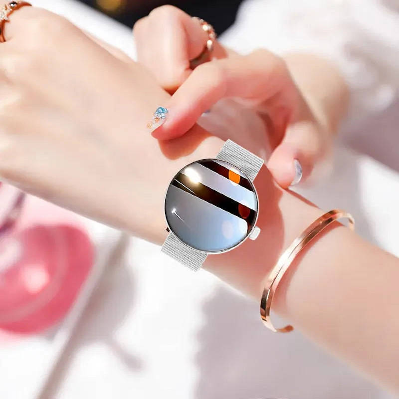 Women's smart watch with circular dial and metal strap in choice of finishes