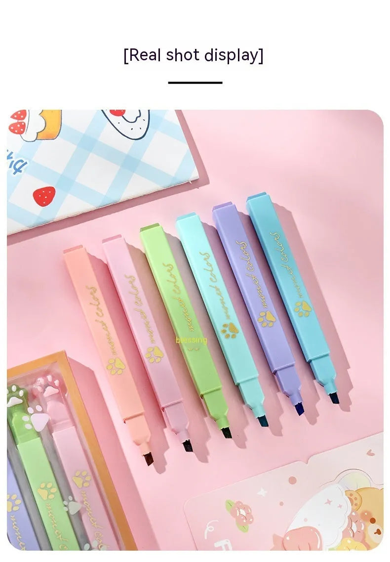 Cat's Paw fluorescent marking pen set showing six coloured pens with oblique nibs in a gift box.