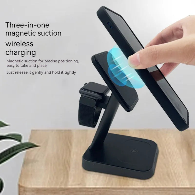 Black cubic 3-in-1 vertical wireless charger and portable power bank on a desk.