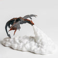 3D printed red dragon night light with glowing effect on a dark surface