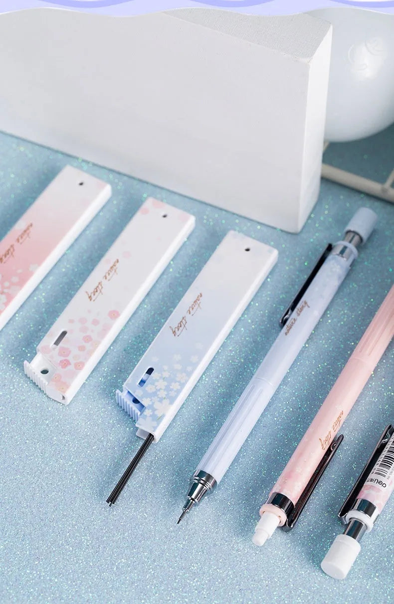 Cartoon automatic pencil set with three pens and HB refill boxes in Sakura law design