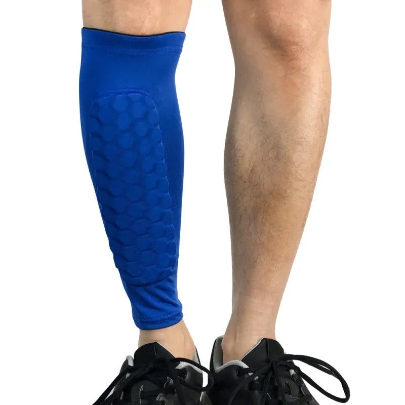 Black lycra football shin guard holder with silicone band on a leg showing secure fit