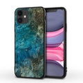Marble pattern print on a slim black iPhone back cover case showing camera and button cutouts.