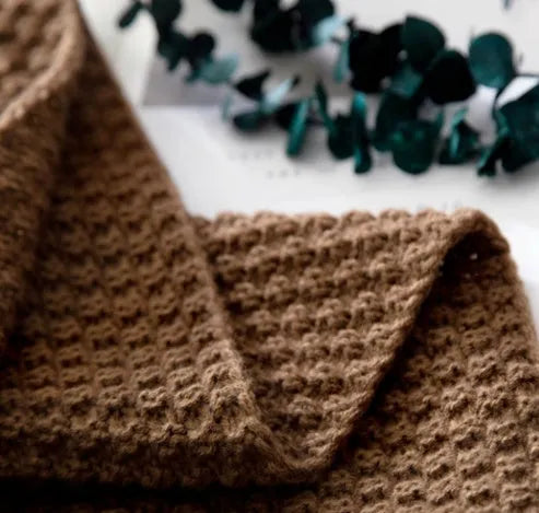 Nordic style fringed acrylic knit blanket in plain weave showing beige colour option