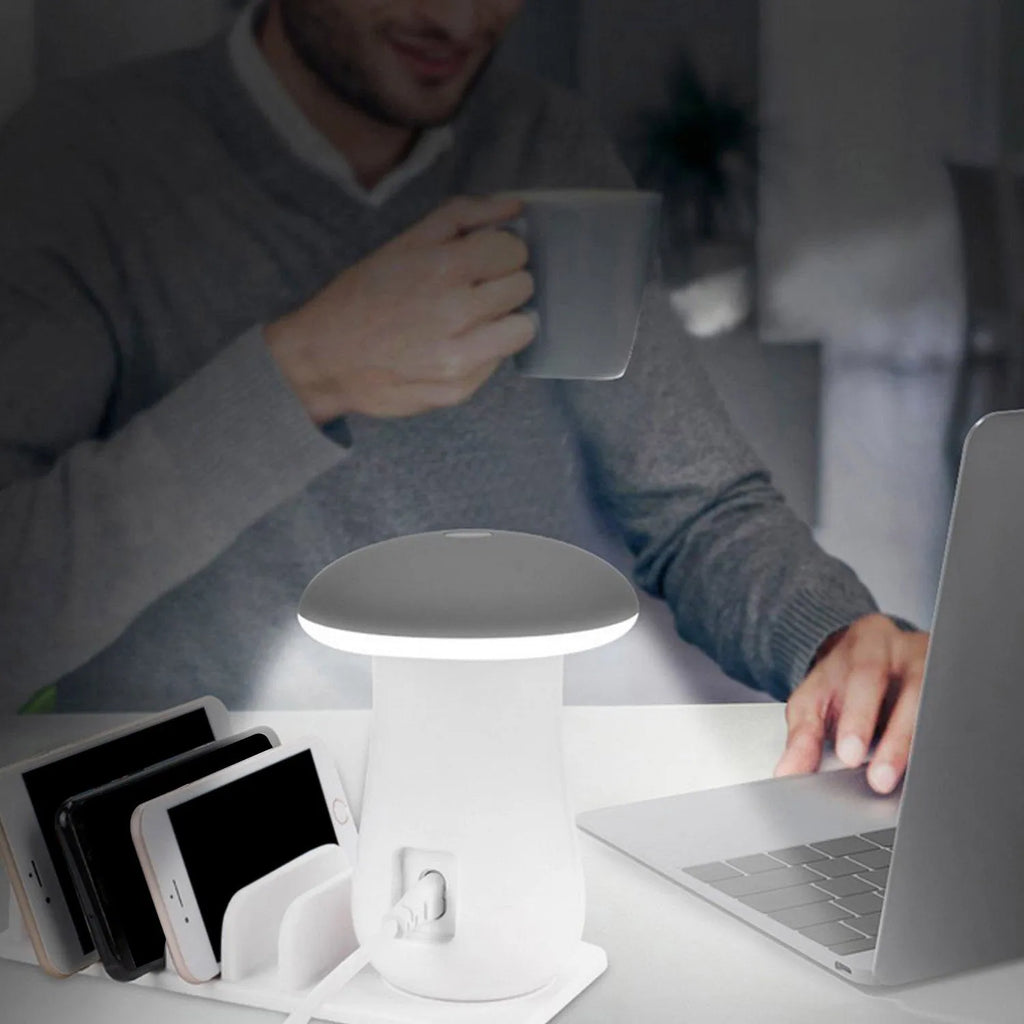 White mushroom-shaped USB charging dock station with 5 ports and integrated LED night light on desk