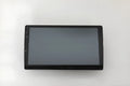 Black 10.1 inch Android car stereo touchscreen head unit with GPS antenna and connection cables