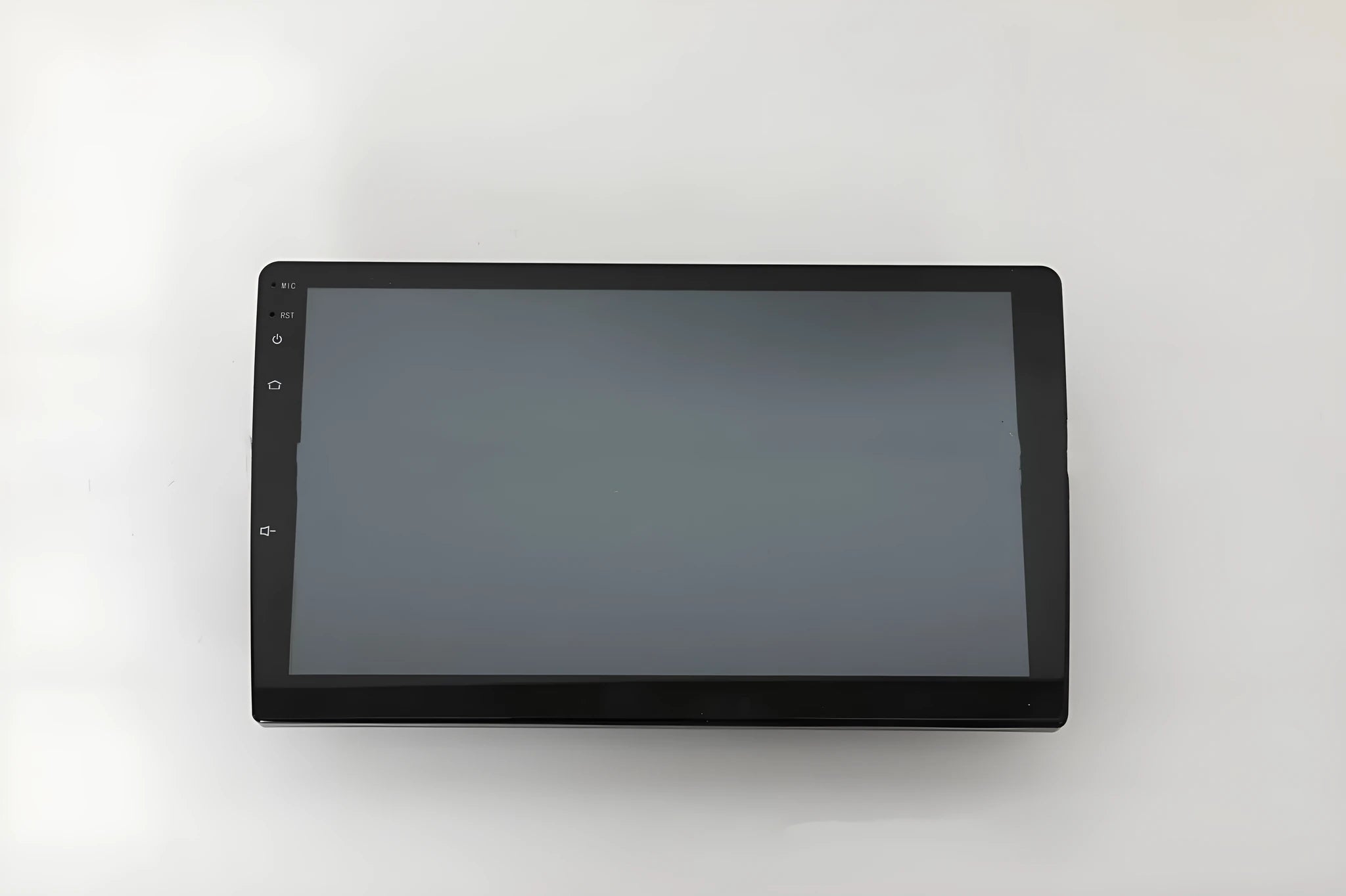 Black 10.1 inch Android car stereo touchscreen head unit with GPS antenna and connection cables