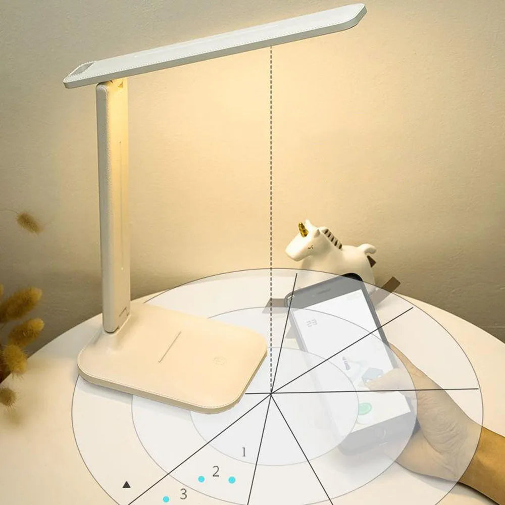 White bedside lamp with touch dimming control and USB charging port for children's bedrooms