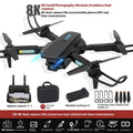 S138 black folding drone with propellers extended, showing its compact size of less than 30cm.