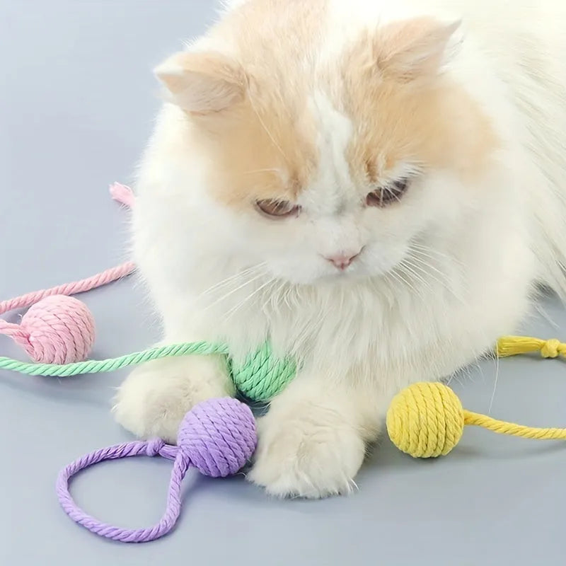 Green cat toy ball with rope and bell for kittens in 6cm and 3cm sizes