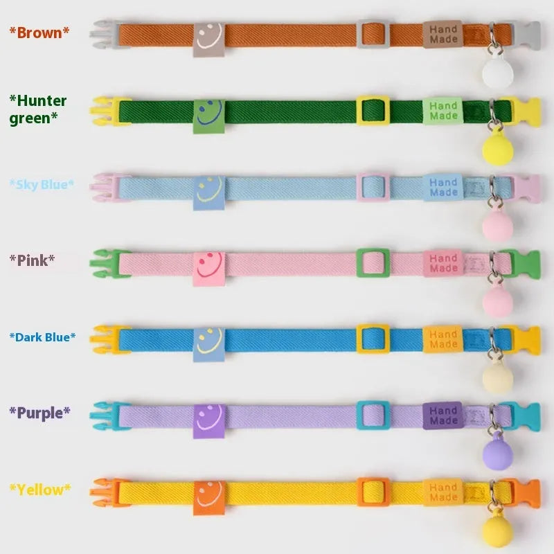 A monochrome high-elasticity polyester collar for a small dog, shown in one of seven colours.