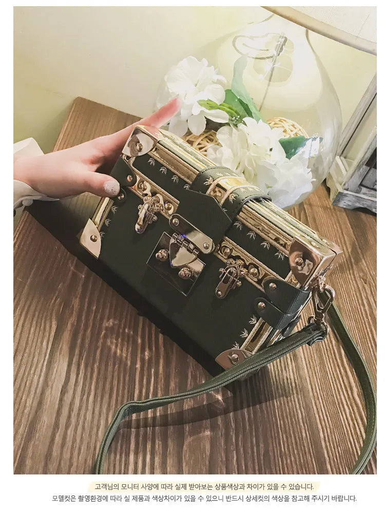 Hard PU leather women's flap handbag with single adjustable shoulder strap in black or green