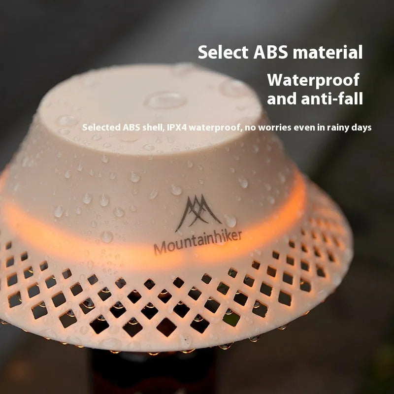 Wine bottle shaped camping lantern in beige or grey colour with USB-C charging port