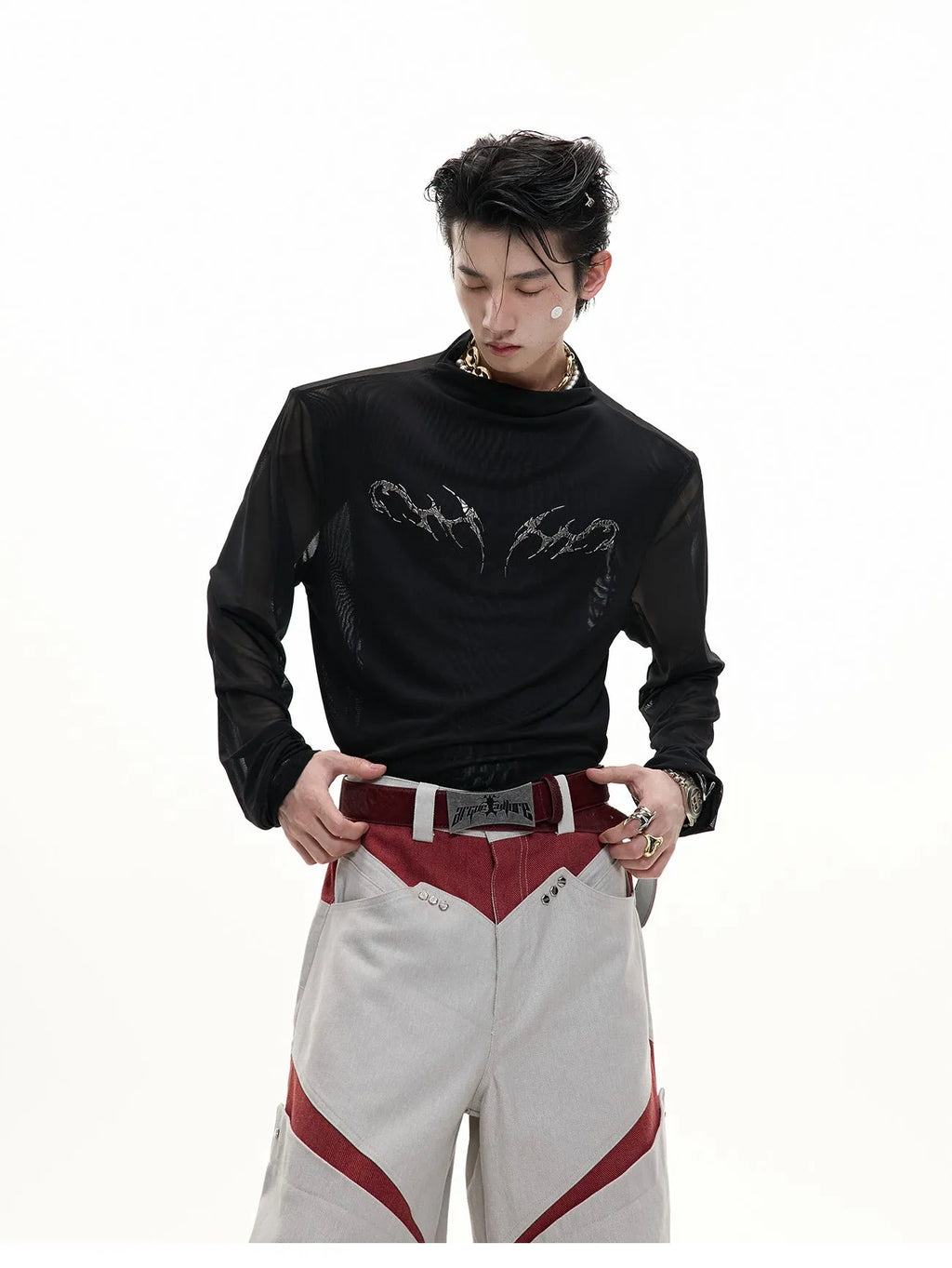 Black niche mesh slim-fit long sleeve bottoming shirt laid flat, showing trendy style and texture.