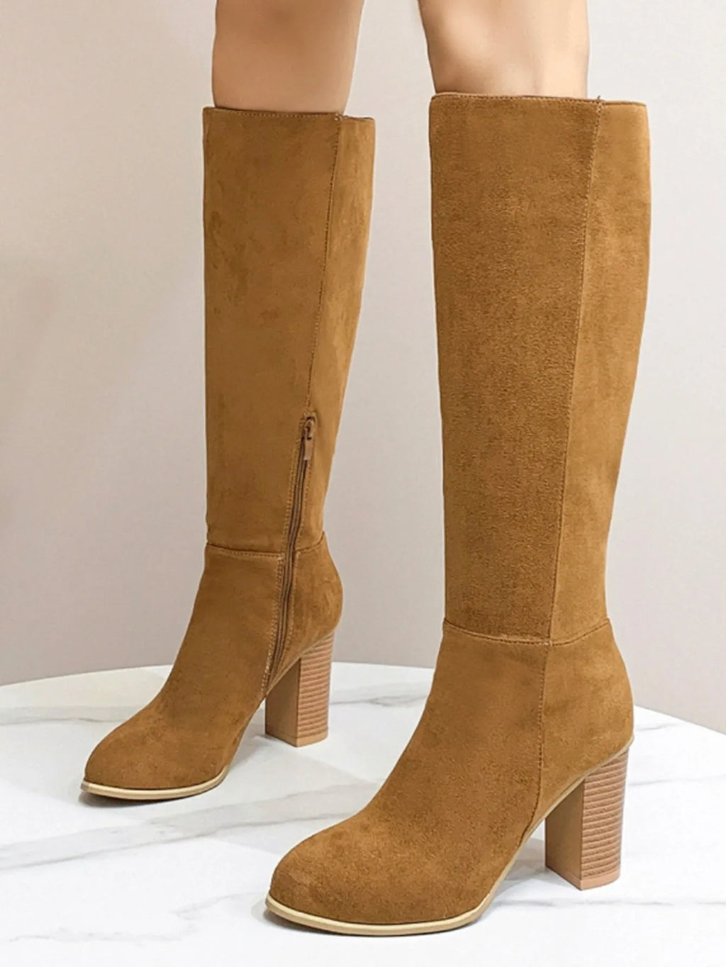 Women's black square toe high heel fashion boots made from artificial PU material