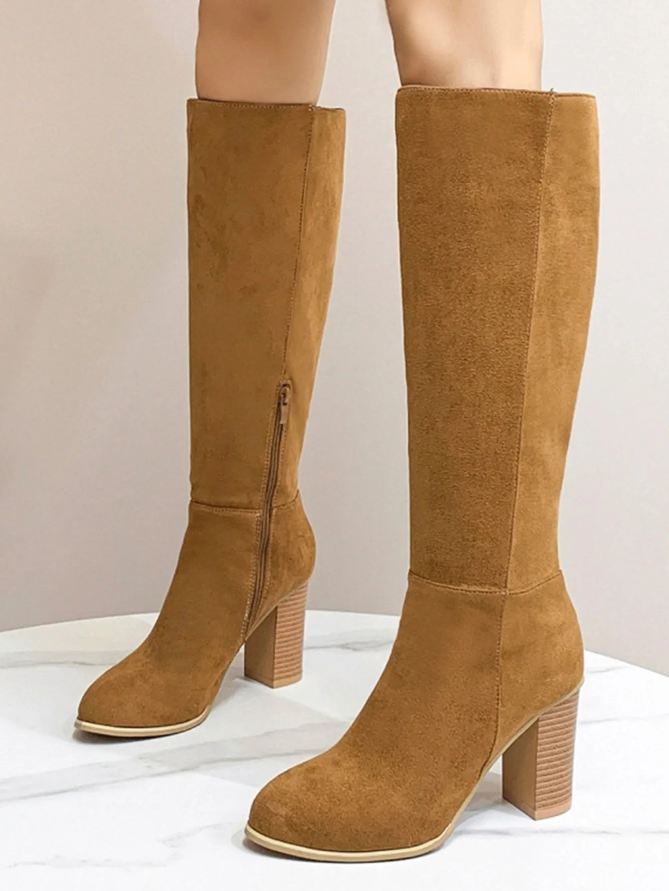 Women's black square toe high heel fashion boots made from artificial PU material