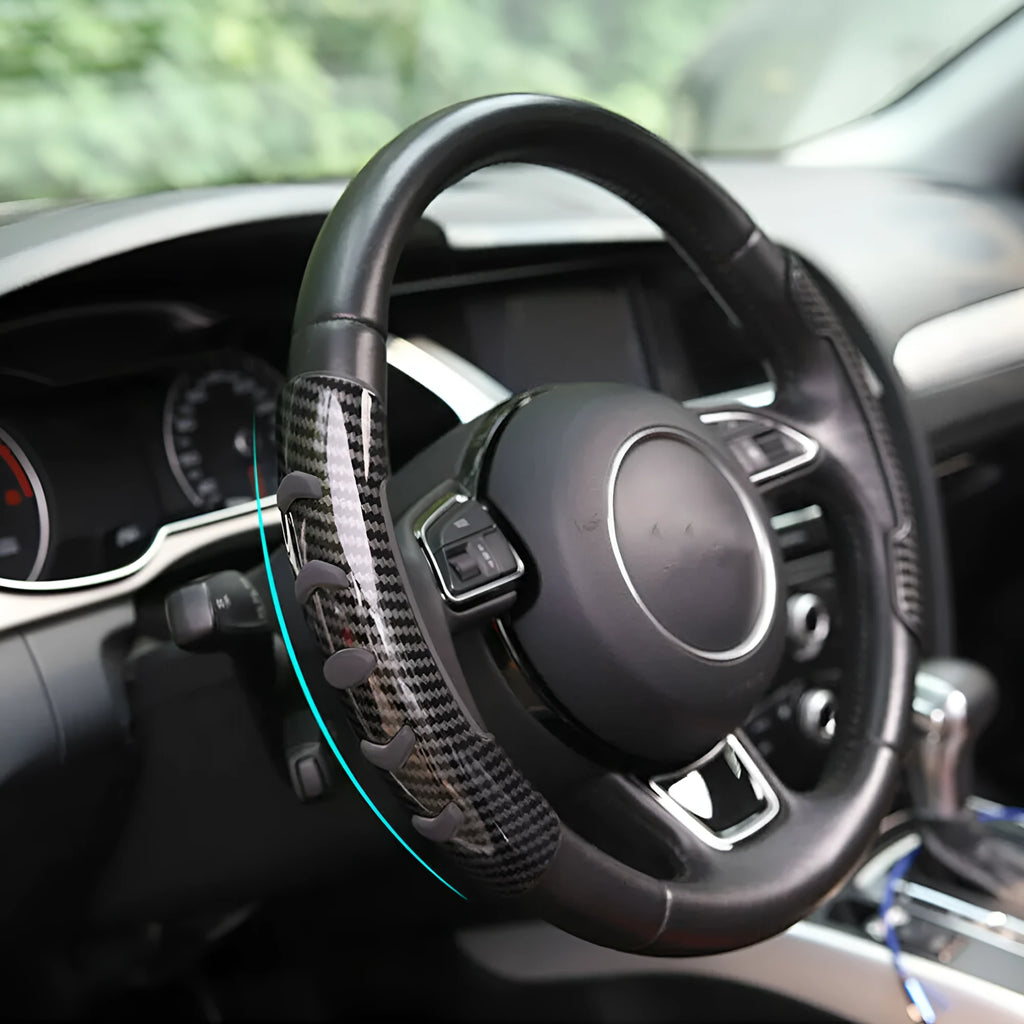 Carbon fibre black steering wheel anti-slip sleeve showing textured surface and 38cm diameter measurement