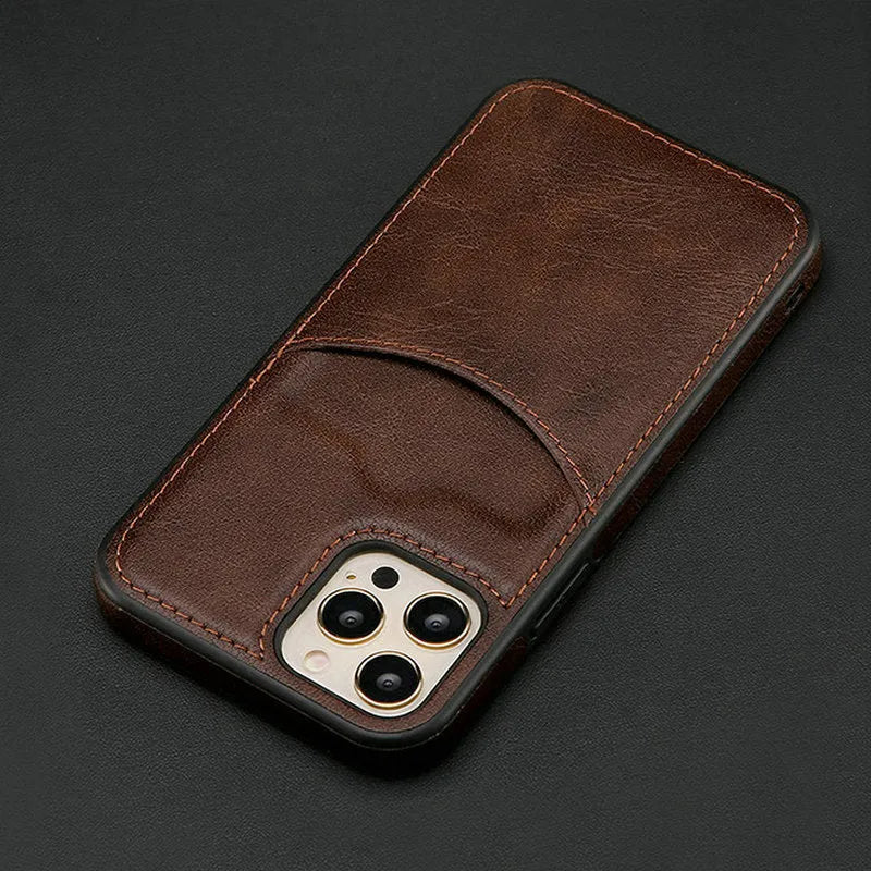Dark blue PU leather protective case for iPhone models 7 through 14 Pro Max on a table.