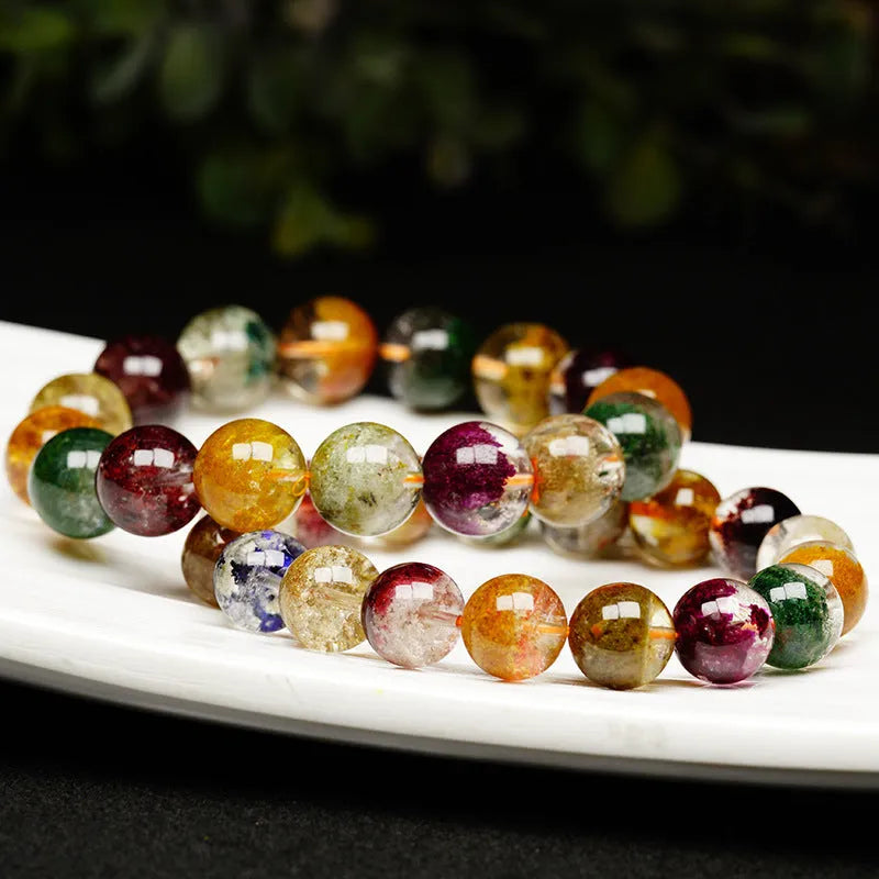 Ethnic style crystal bracelet with colourful ghost cornucopia beads, 10mm size, on an adjustable band.