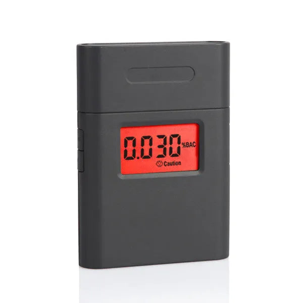 Black handheld At-838 alcohol breath detector with display screen showing BAC measurement