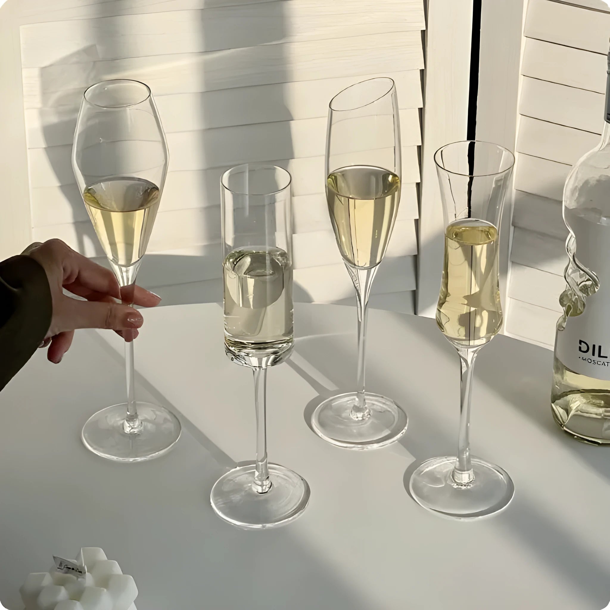 Six French champagne glasses with beaded decoration in various crystal colour finishes