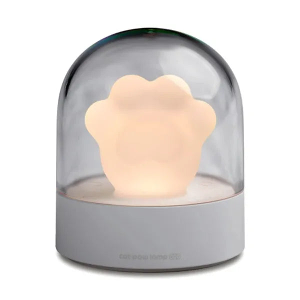 Cat paw-shaped night light with music box function showing pink colour option with illuminated soft light
