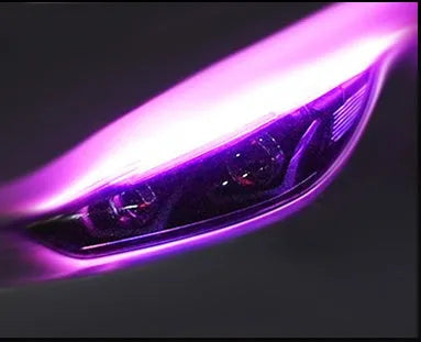 Car LED daytime running light strip with flowing turn signal indicator in silicone housing