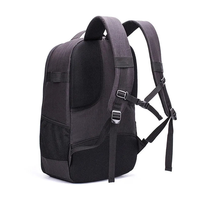 Black Oxford cloth drone backpack showing multiple internal compartments for camera and laptop storage