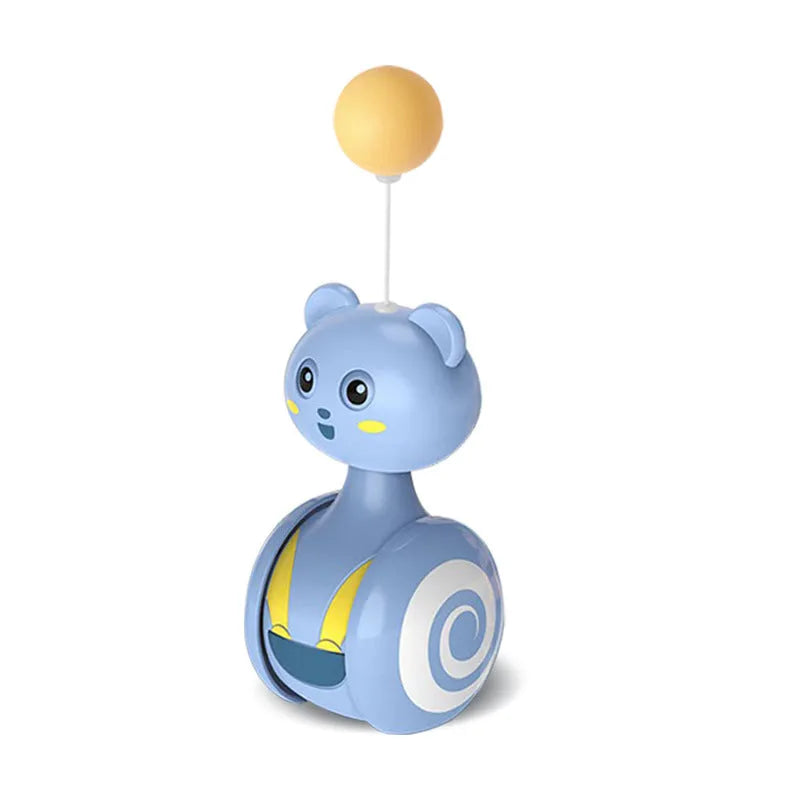 Pink and blue cat tumbler toy with rotating ball and feather wand options on a plain background.