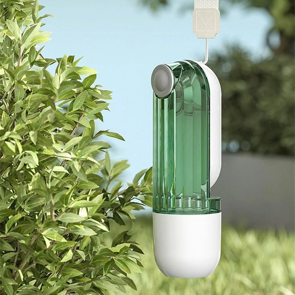 Beige foldable dog water bottle with integrated food container, shown with press-button tray.